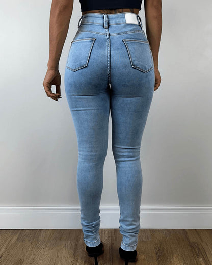 High-Rise Skinny-Jeans in hellem Blau im modischen Stil